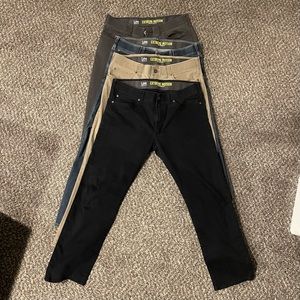 4 pairs of Lee Extreme Motion jeans EUC 36x30 in blue, black, tan, and gray